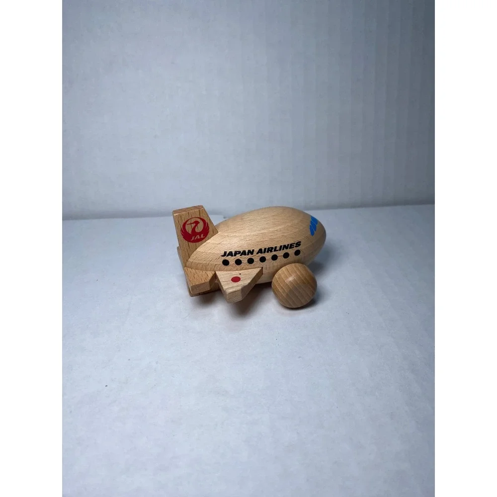 Vintage Japan Airlines JAL Wooden Toy Airplane Collectible Natural Wood Rolling